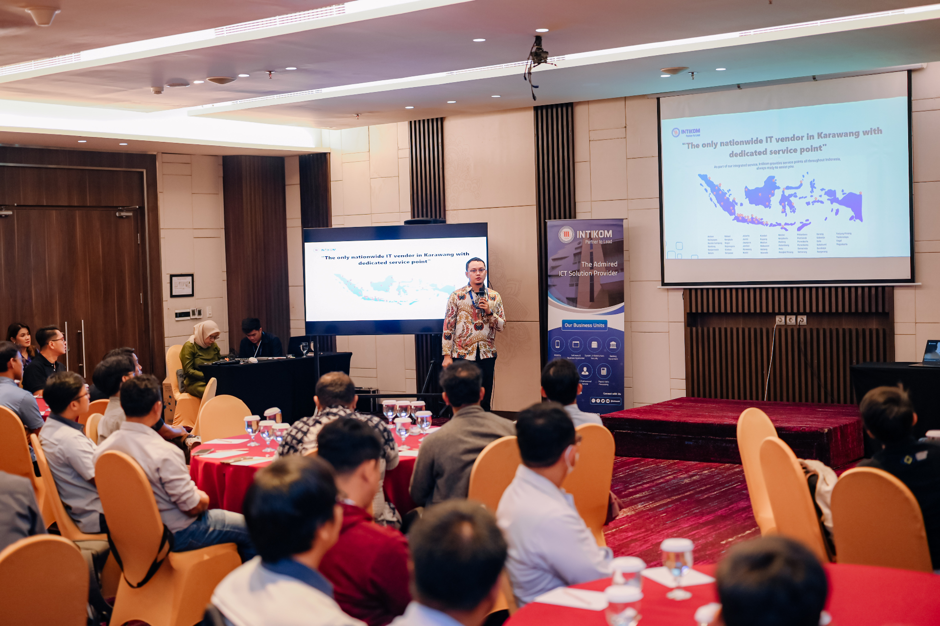 Presenting services and products to customers at an industry event.